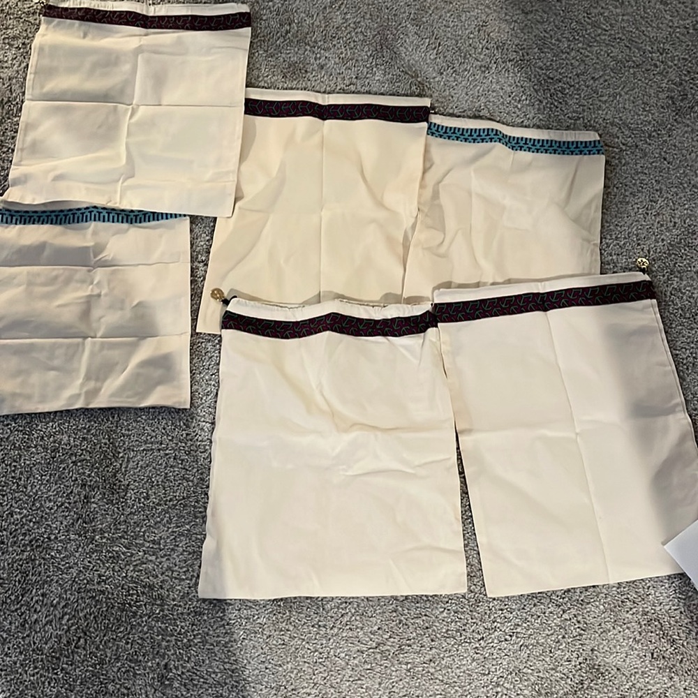 NOT AVAILABLE FOR SALE! New Tory Burch dust bags. Selling all together.